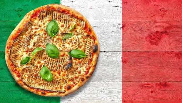 Italy flagged wooden Table with parmigiana pizza. — Stock Photo, Image