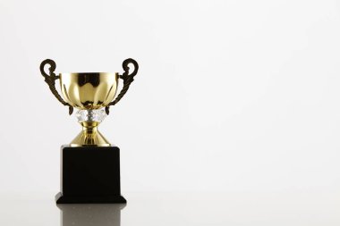 gold trophy on white background clipart