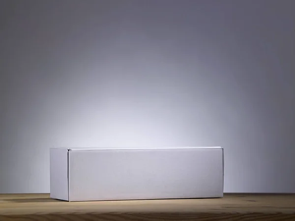 Caja Papel Blanco Blanco Sobre Mesa Madera —  Fotos de Stock