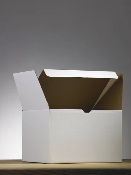 Caja Papel Blanco Blanco Sobre Mesa Madera —  Fotos de Stock