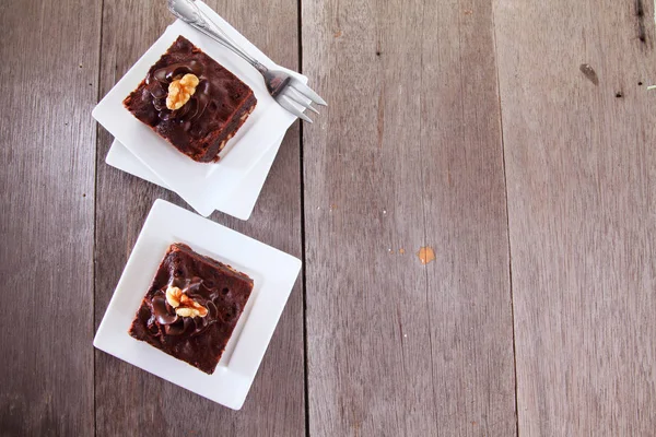 Delicioso Brownie Fondo Madera —  Fotos de Stock