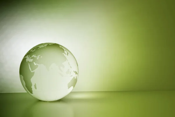 Close Van Glazen Globe Groene Achtergrond — Stockfoto