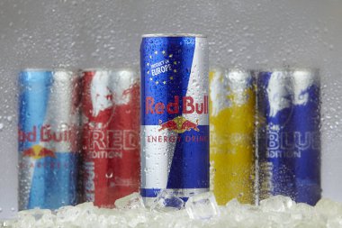 Kuala Lumpur, Malaysia - March 14, 2017: red bull aluminum can in freezer with ice cubes clipart