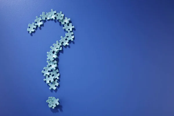 Puzzle Pieces Form Question Mark Blue Background — Stock Photo, Image