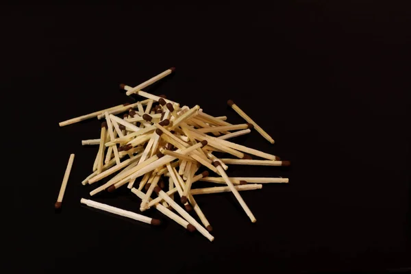 Scattered Matches Reflected Black Mirror Table — Stock Photo, Image