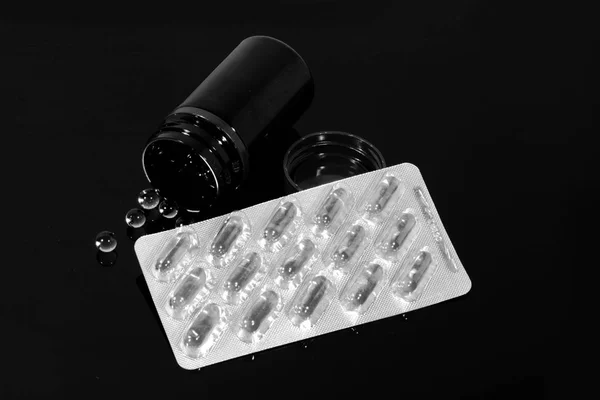 Pills Fish Oil Capsules Jar Pills Pack Reflected Black Mirror — Stock Photo, Image