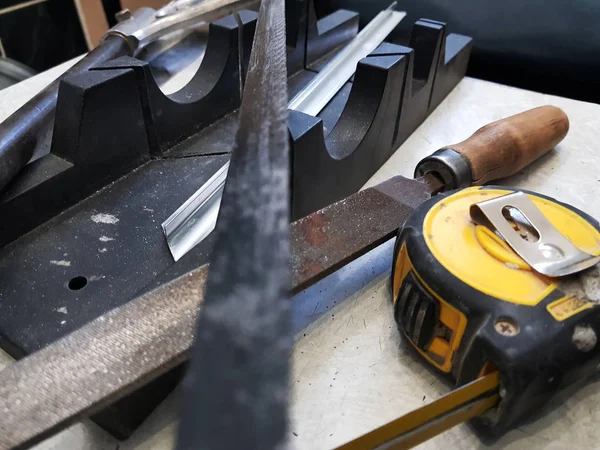 Repair - building with tools, tape measure, miter box, file, hacksaw, ruler — Stock Photo, Image