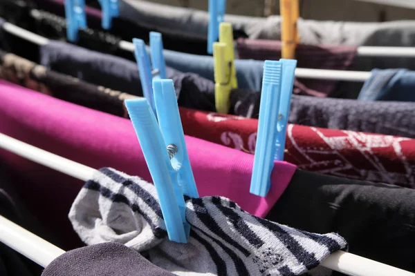 Washed clothes on a drying rack