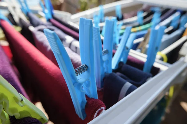 Washed clothes on a drying rack