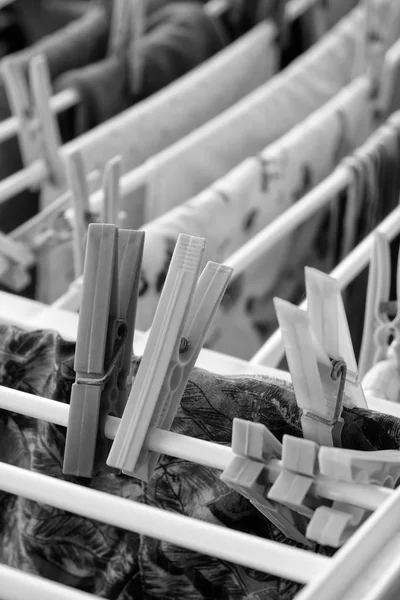 Washed clothes on a drying rack