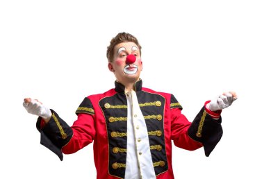 Gülümseyen neşeli yüzlü komik bir palyaço.