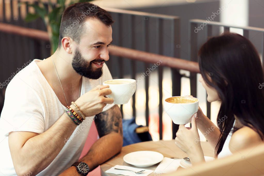 Romantic couple dating in cafe