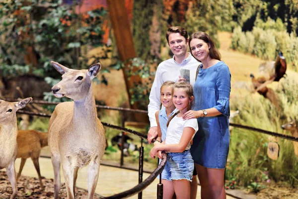 Joyful family in nature museum