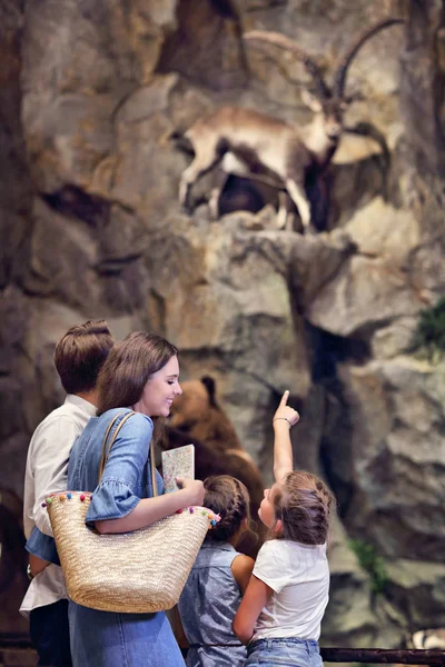 Joyful family in nature museum