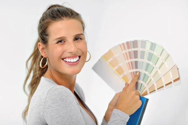 Mature woman doing home improvements — Stock Photo, Image