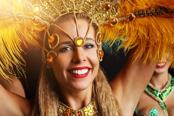 Brazilian women dancing samba at carnival