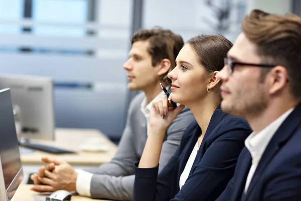 Group of business people attending a conference — Stock Photo, Image