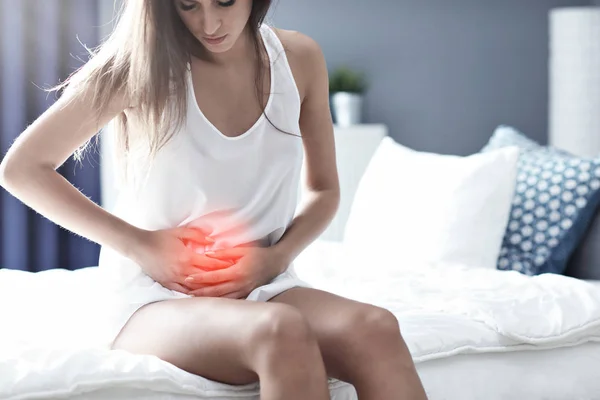 Adult woman waking up in the morning feeling sick — Stock Photo, Image