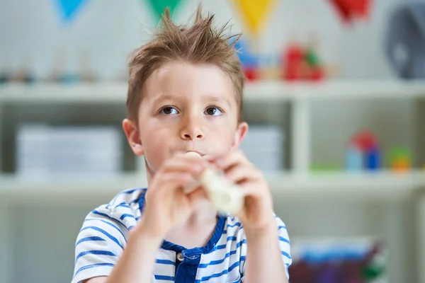 Adorable little boy in kindergarten — Stock Photo, Image