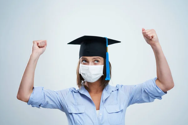 Student wearing protective mask isolated over white background — Stock Photo, Image