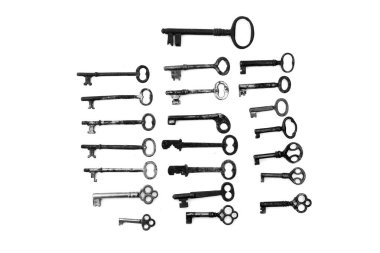 Anahtarlar. Eski iskelet anahtarlar. Bakır veya bronzdan yapılmış klasik anahtarlar. Beyazda izole edilmiş. Kilit ve Dolapların Antik Anahtarları. Antika Anahtar Koleksiyonu. Kalbimin anahtarı. Kilit ve Anahtar. Asma kilit anahtarı. Güvenlik.