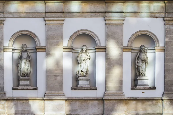 Female sculpture in the niches of the wall. Vein. Austria