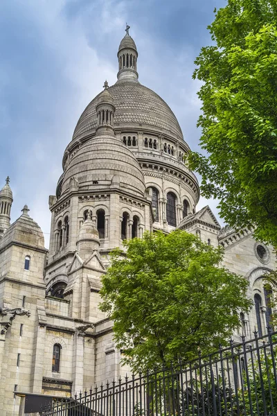 Basilica of the Sacred Heart of Paris, commonly known as Sacre-Coeur Basilica and often simply Sacre-Coeur, is a Roman Catholic church and minor basilica, dedicated to the Sacred Heart of Jesus, in Paris, France