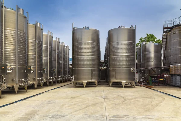 Large metal containers for fermenting and making wine — Stock Photo, Image