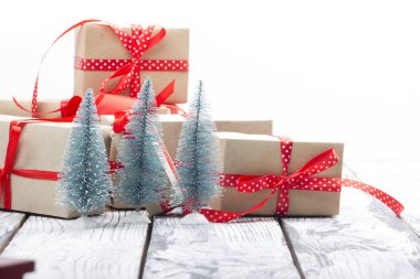 Toy car with Christmas gifts and tree isolated on white backround. Delivery.