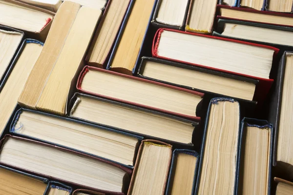 Stack of books background. many books piles. — Stock Photo, Image