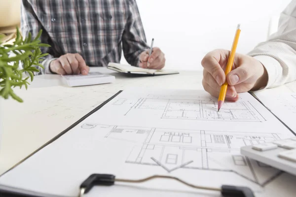 Architects working on blueprint, real estate project. Architect workplace. Construction concept. Engineering tools.