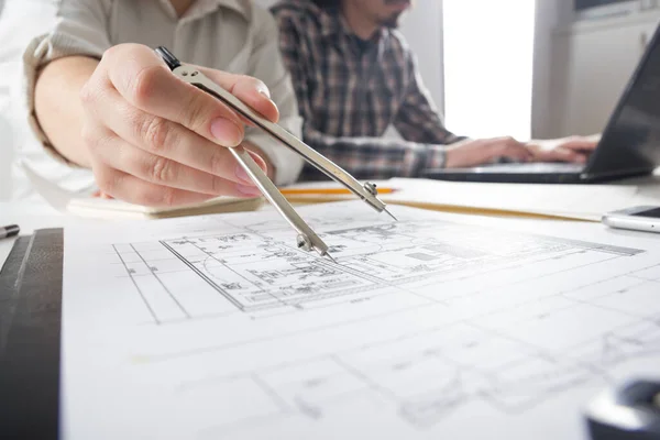 Architects working on blueprint, real estate project. Architect workplace. Construction concept. Engineering tools. — Stock Photo, Image