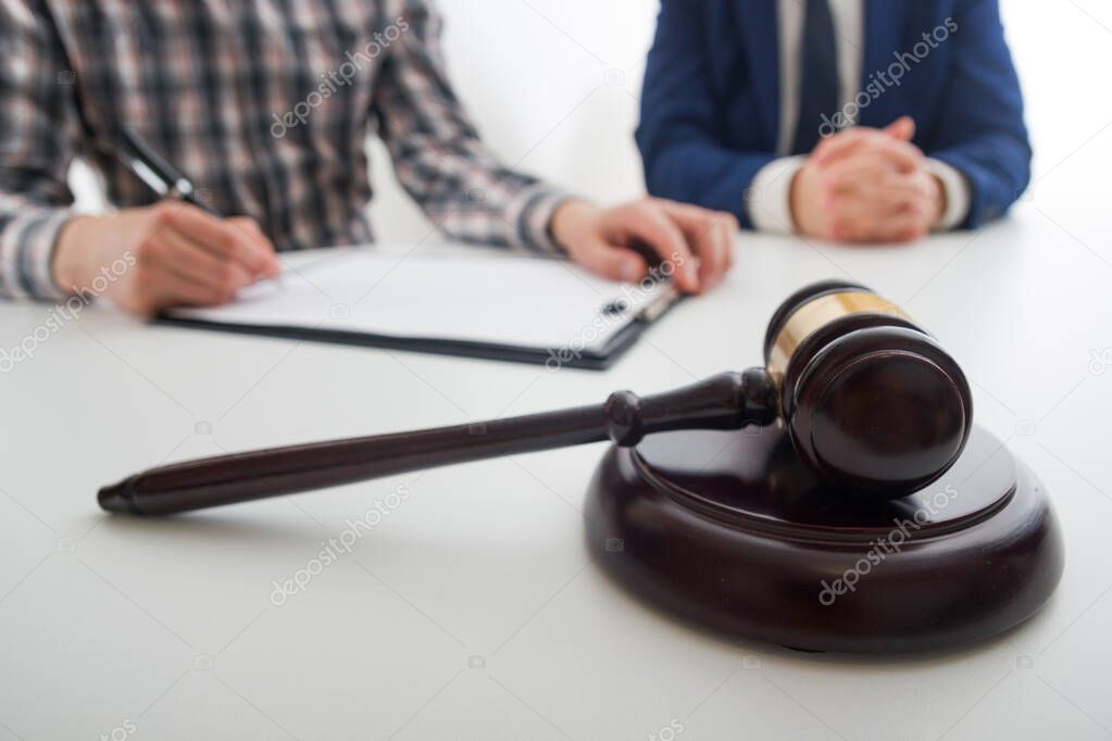 Law, advice and Legal services concept. Lawyer and attorney having team meeting at law firm.
