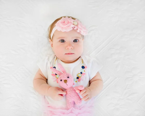 Sad Baby Girl Months Old Holding Her Toy Starring Camera — Stock Photo, Image