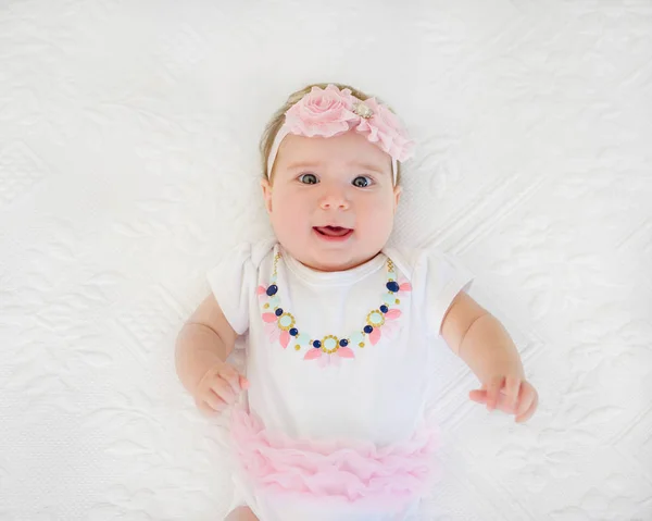 Happy Excited Baby Girl Months Old Resting Bed Dressed Headband — Stock Photo, Image