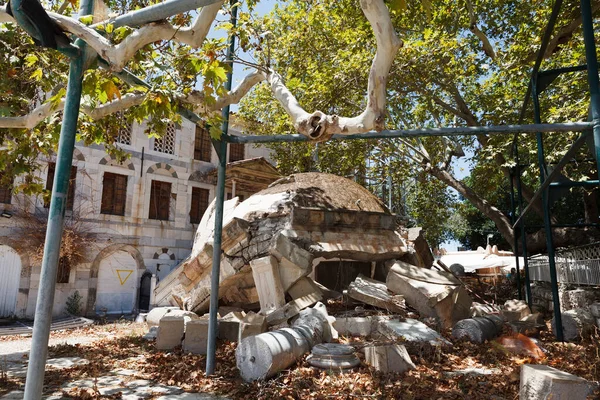 The Tree of Hippocrates, a plane tree under which Hippocrates of Kos taught his pupils the art of medicine. Square of the Platane, Kos. South Aegean, Greece.