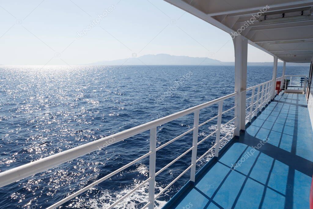 View from a boat to the blue sea. Greece vacations.
