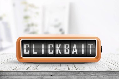 Turuncu renkli bir dijital cihazda metin clickbait