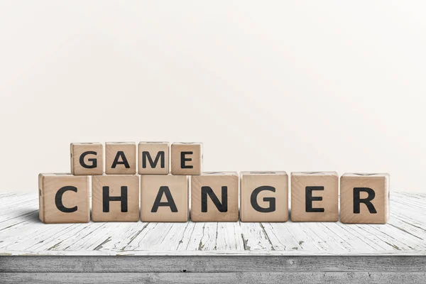 Game changer sign made of wooden blocks