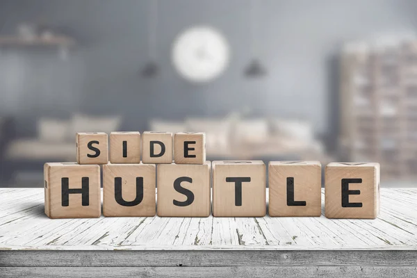 Side hustle sign on a plank table