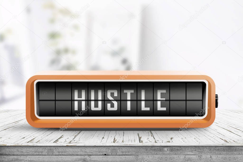 Hustle alarm on a wooden table in a bright room