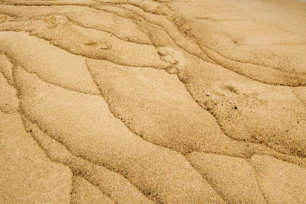 Areia Uma Praia Com Padrões Onda — Fotografia de Stock