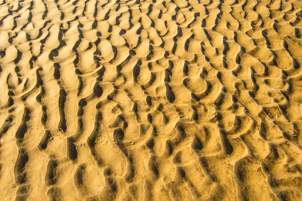 Arena Una Playa Con Patrones Olas — Foto de Stock