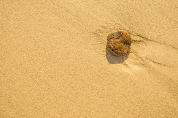 bir plaj çakıl taşı