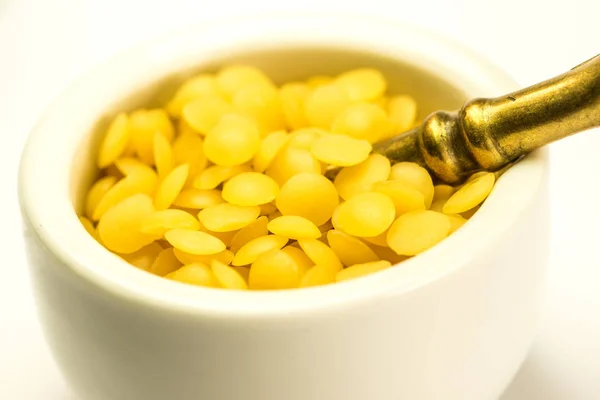 Bee wax, closeup of the bee product with cream pot — Stock Photo, Image