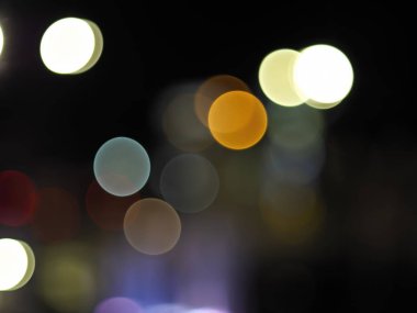 Festive bokeh background, soyut arkaplan ile bokeh sönmüş ışıklar, gece ışığı arka planında Defodaklanmış şehir manzarası