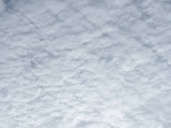 Thin clouds and paper-like colors, thin sheets white clouds, texture background