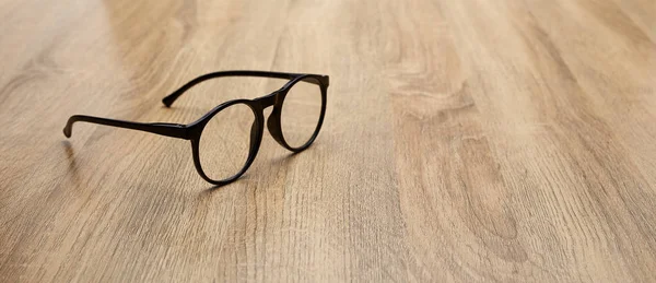 Lunettes Cadre Vintage Noir Sur Fond Bois Table Vue Haut — Photo