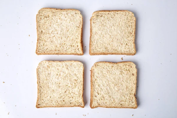 Ломтики Цельного Хлеба Пшеницы Изолированы Белом Фоне — стоковое фото
