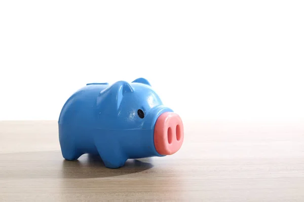 Plastic Blue Piggy Bank Wooden Table — Stock Photo, Image